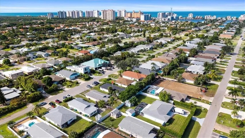 View of property location with nearby suburban area