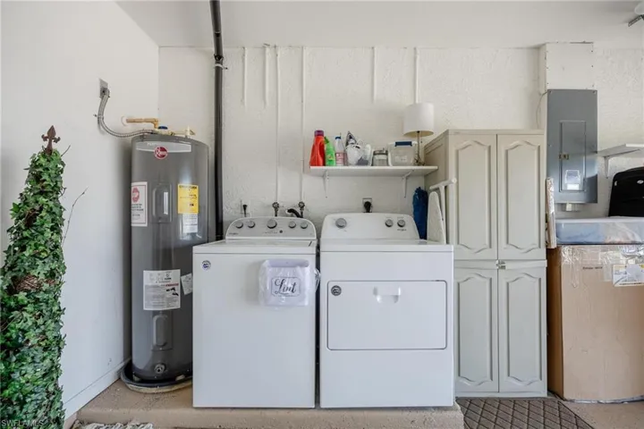 Laundry in garage, keeps indoors quiet.