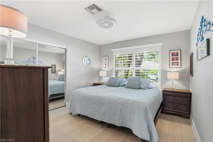 Large windows with plantation shutters.