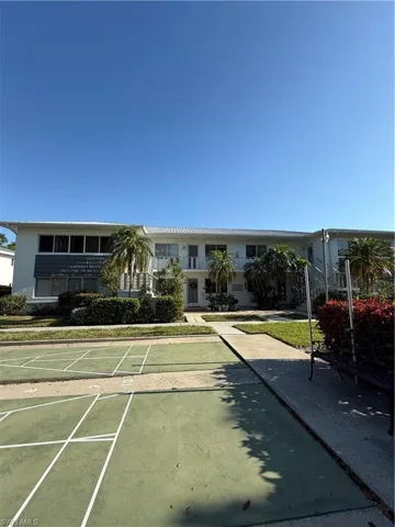 View of community featuring shuffleboard