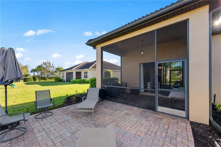 View of patio / terrace with a sunroom