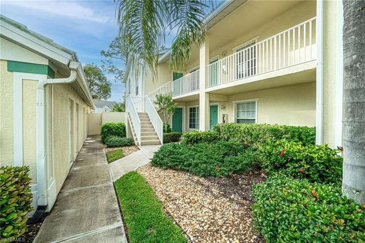Walkway to unit, located on second floor, #4-202.