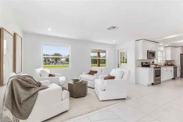 Tiled living room with bright, natural light