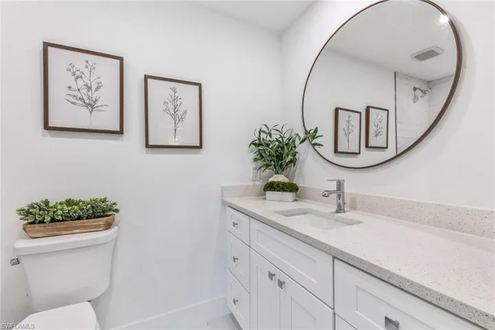Bathroom with vanity and toilet