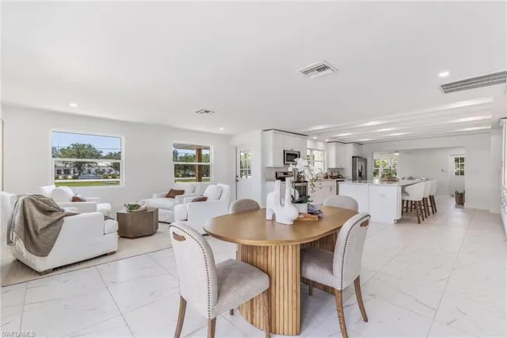 Dining space featuring light tile floors