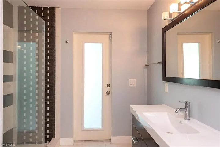 Bathroom with vanity and walk in shower