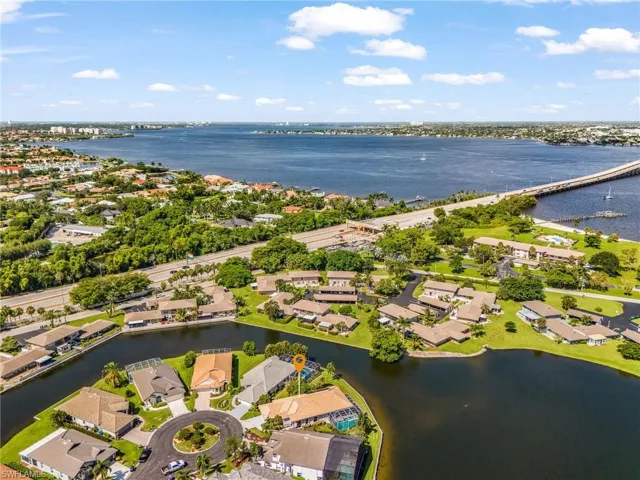 Waterfront property with canal access, private dock, and screened lanai