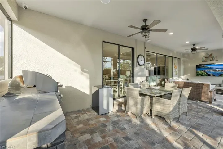 View of patio with ceiling fan
