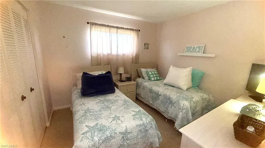 Bedroom featuring baseboards