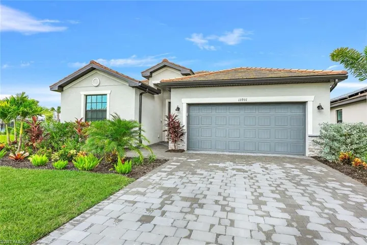 View of front of home featuring a garage