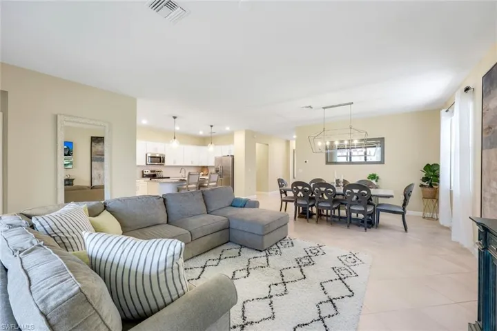 Living room featuring a notable chandelier