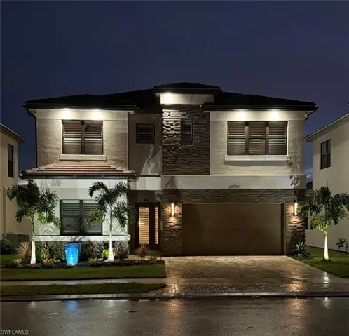 Exterior Landscaping & House Lighting plus Gutters added as well.