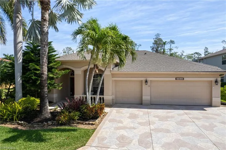 Front of home with stamped driveway