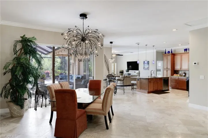 Open concept dining, kitchen and living area