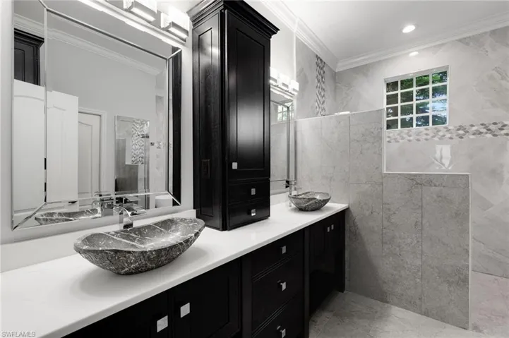 Primary bath with raised basin sinks