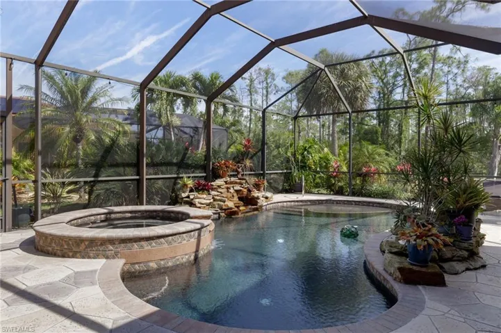 This tropical oasis complete with sun shelf and spa.