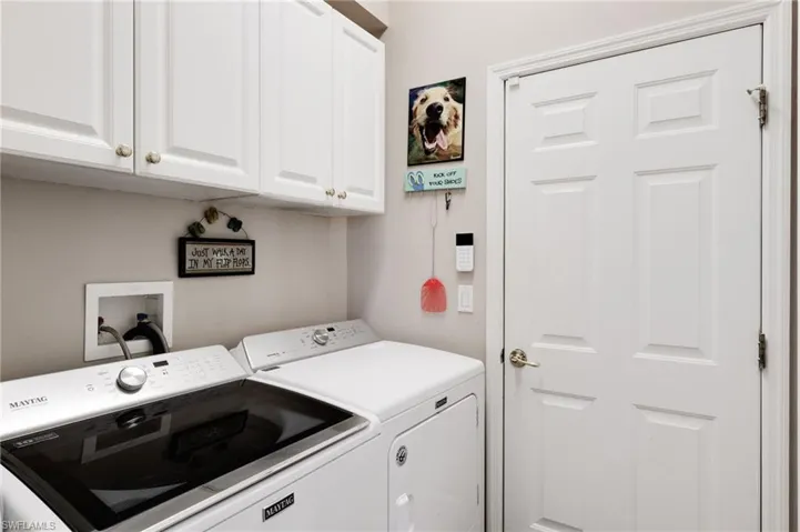 Laundry room with door to 3-car garage. Large double closet to the right.