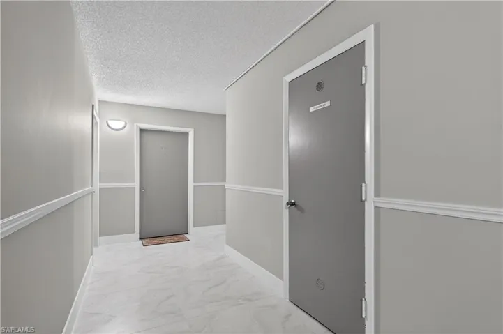 Newly tiled hallway with fresh paint
