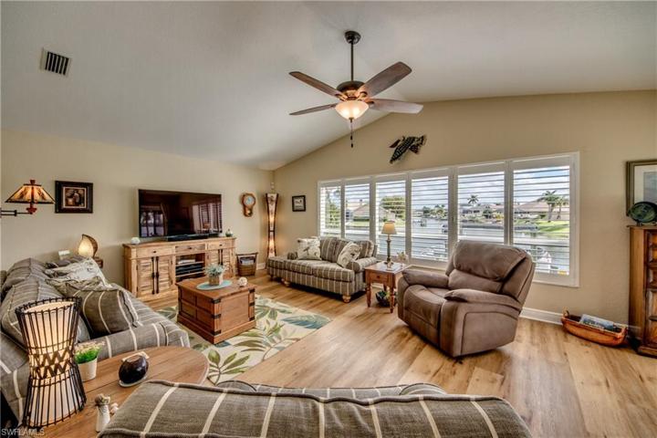 The room that captures it all. Spacious, cozy with lots of windows providing natural light and wonderful waterfront views
