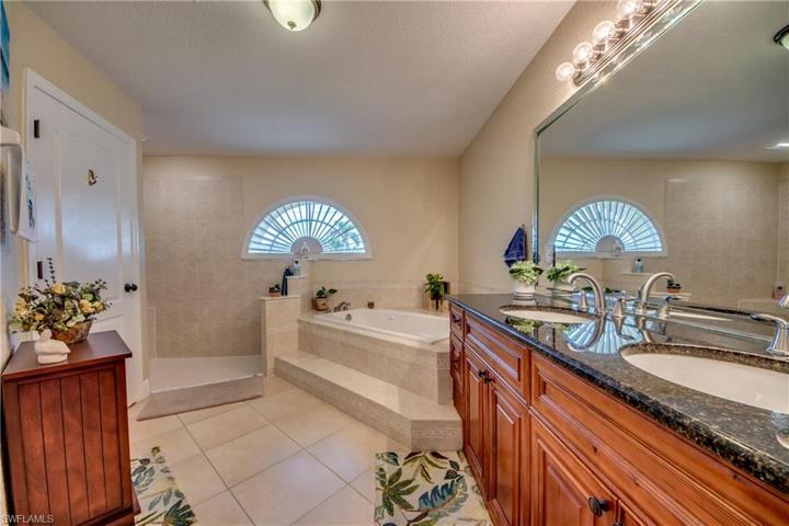 Room to roam in this well laid out master bathroom. Large soaking tub.