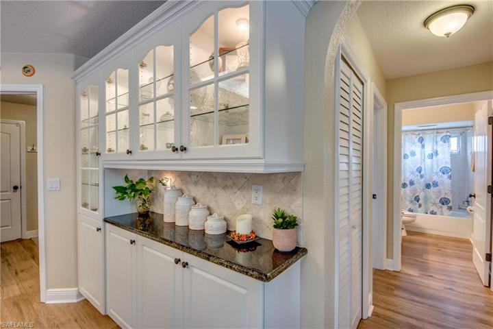 Custom, lighted cabinetry. Adds LOTS of bonus storage and showcase your best dinnerware.