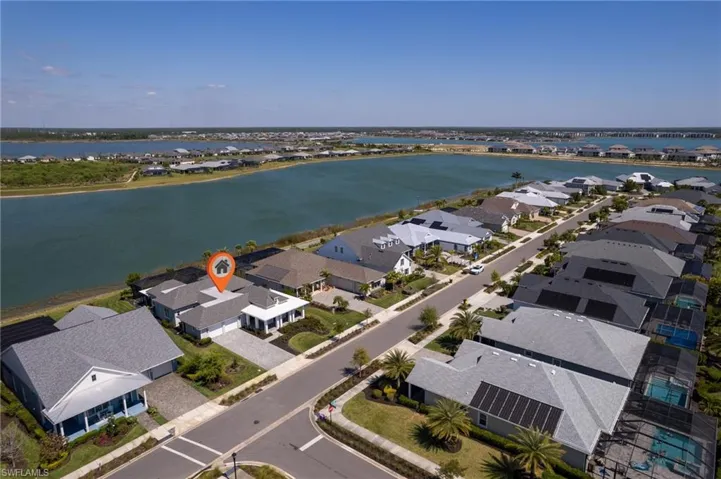 Bird's eye view with a residential view and a water view