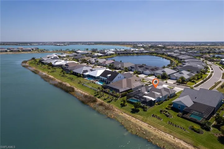Aerial view with a residential view and a water view
