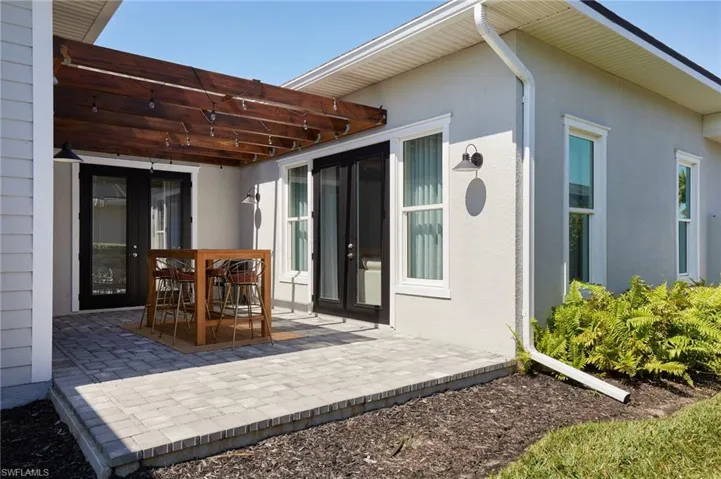 View of patio / terrace featuring outdoor dining space and a pergola