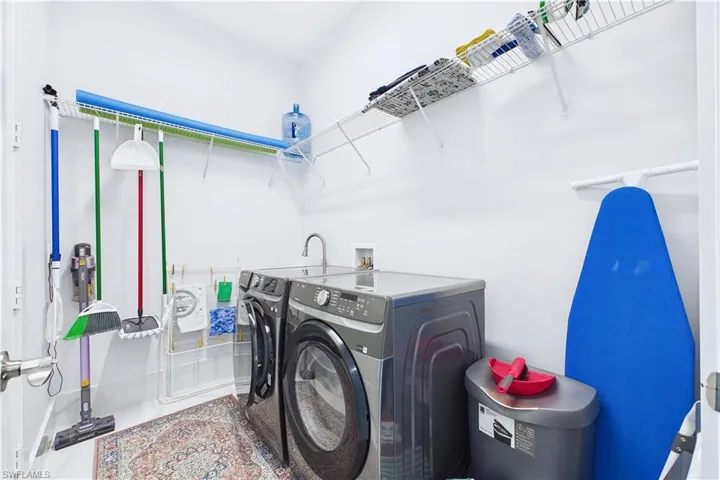 Laundry area featuring washing machine and dryer