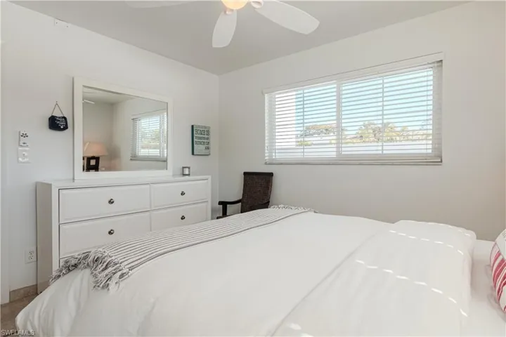Bedroom featuring a ceiling fan