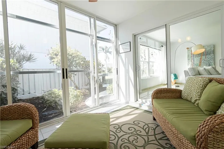 Sunroom / solarium featuring tile patterned flooring