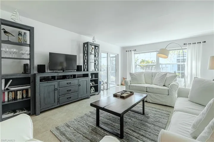 Living room featuring light tile patterned flooring