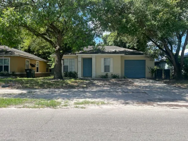 Ranch-style home with a garage