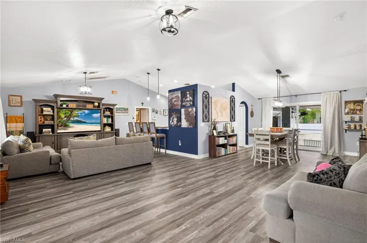 Living area featuring wood finished floors and baseboards