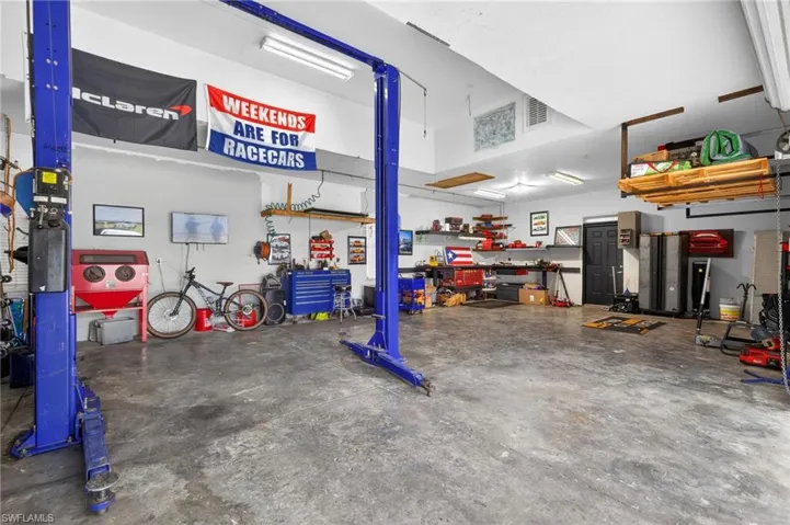 Garage featuring a workshop area