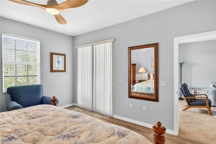 Bedroom with light wood-type flooring and ceiling fan