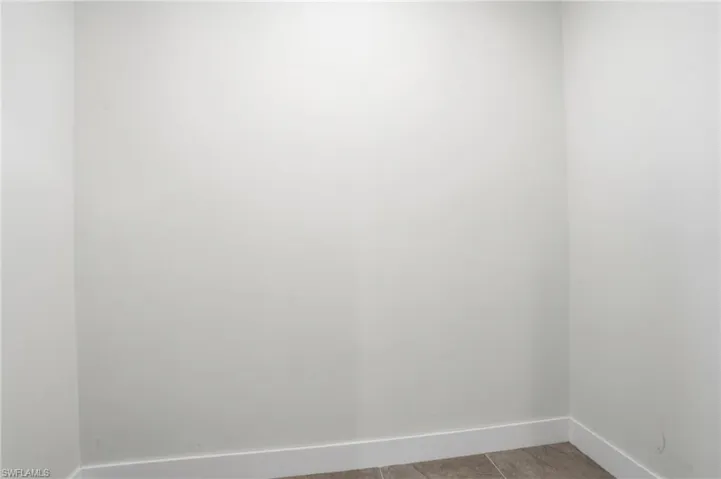 Empty room with baseboards
