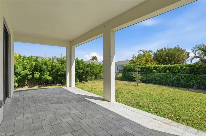 Fenced backyard featuring a patio area