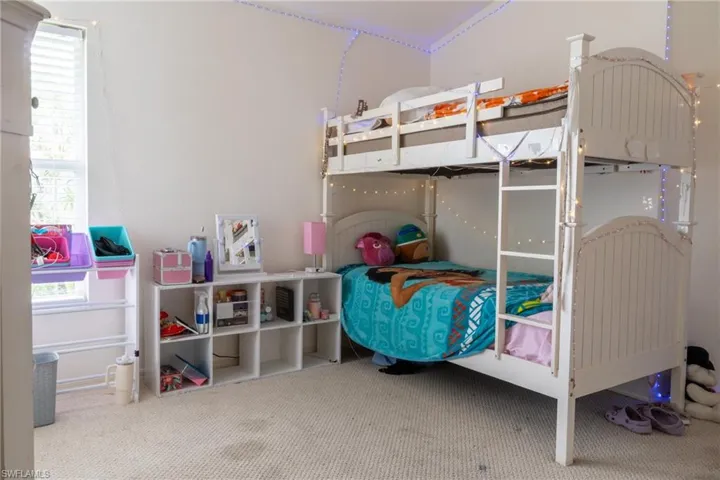 Bedroom featuring carpet flooring