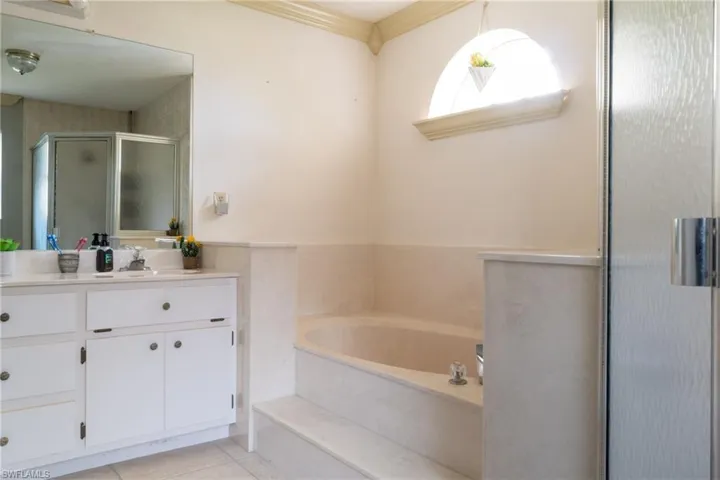 Soaking tub and shower in primary bathroom