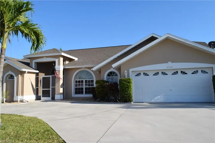 Freshly painted home with circular driveway