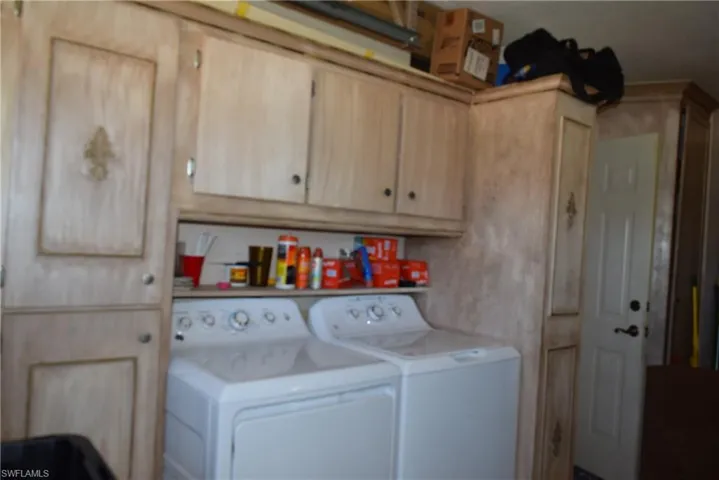 Washer and dryer with built in cabinets