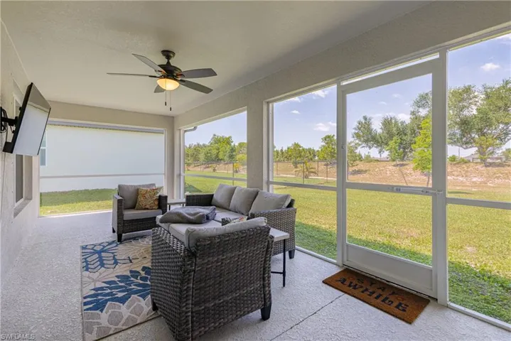 Large screened-in lanai ready to entertain