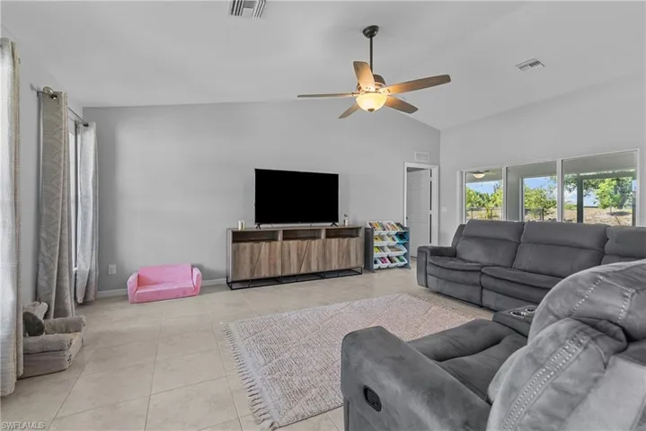 HUGE open living room with vaulted ceiling