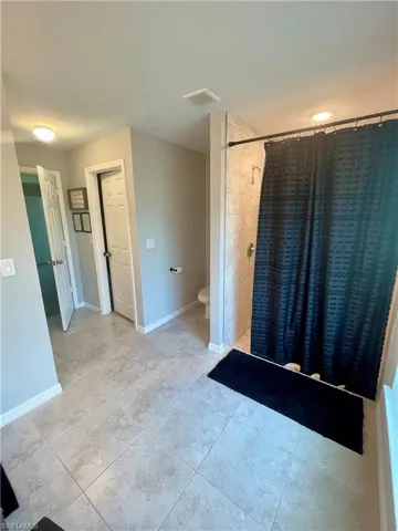 HUGE master bathroom with two walk-in closets
