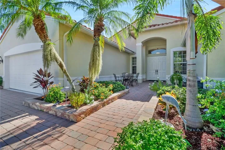 Entrance to property featuring a garage