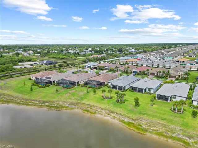 Aerial view of large backyard and lake view