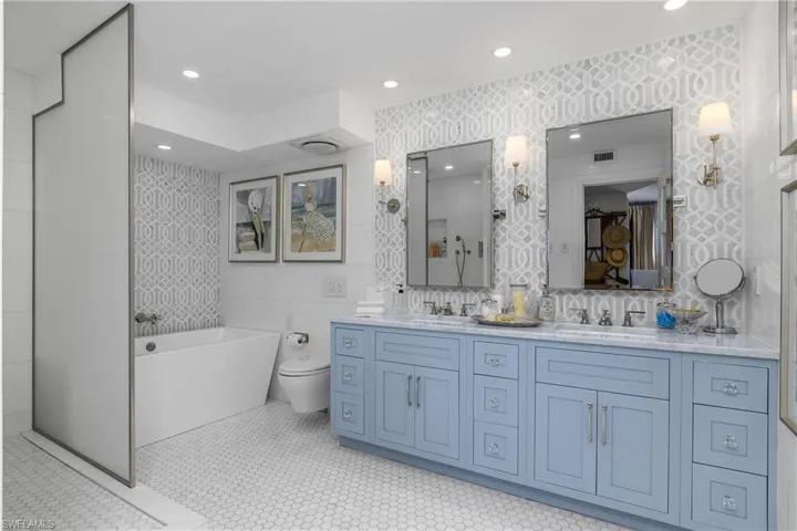 Beautiful finishes, with walk-in shower alongside the soaking tub
