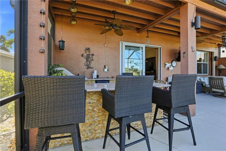 View of patio / terrace featuring a ceiling fan