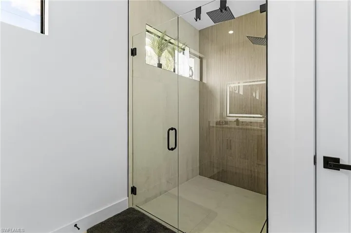 Bathroom with a stall shower